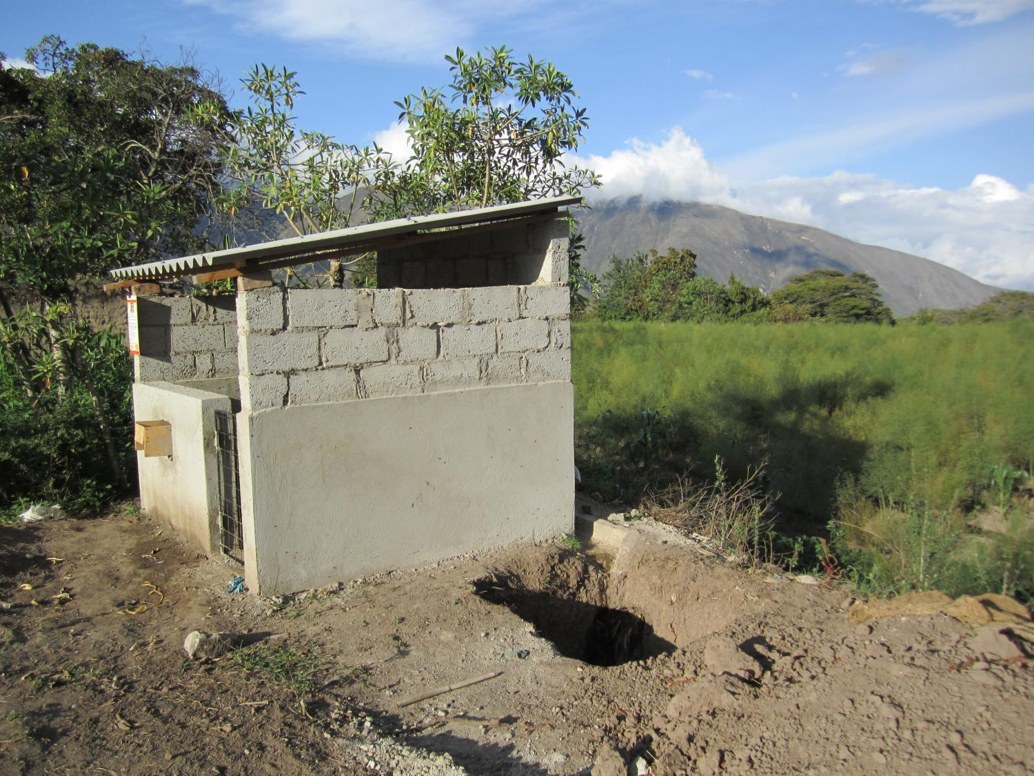 Beginning phases, a newly built pigpen and space for the Biodigester barrels