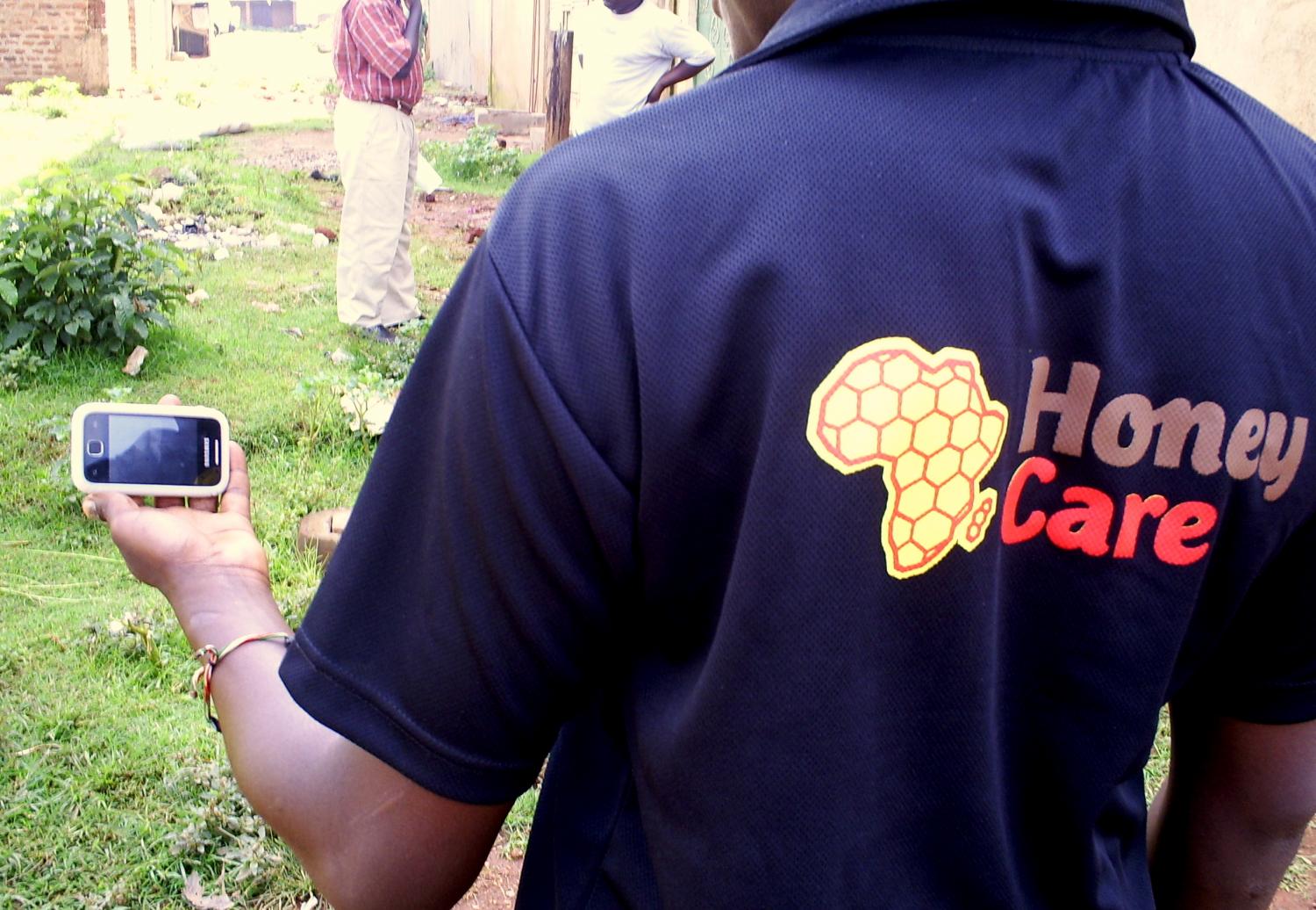 Smartphones are used by Honey Care's hive technicians to reach remote farmers with their beekeeping services.