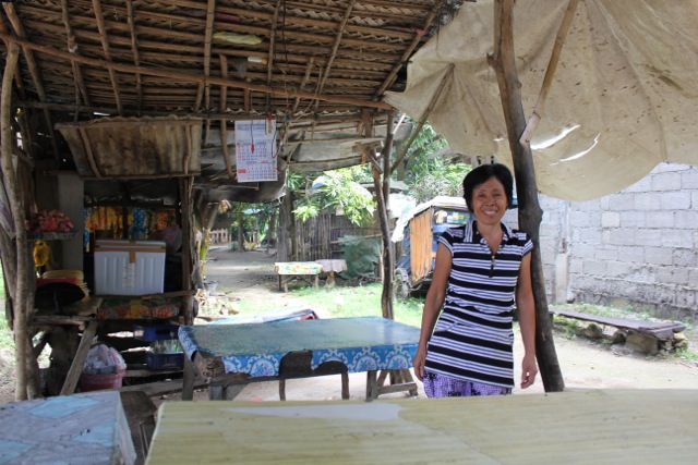 A typical NWTF client and her place of business, on the island of Cebu.