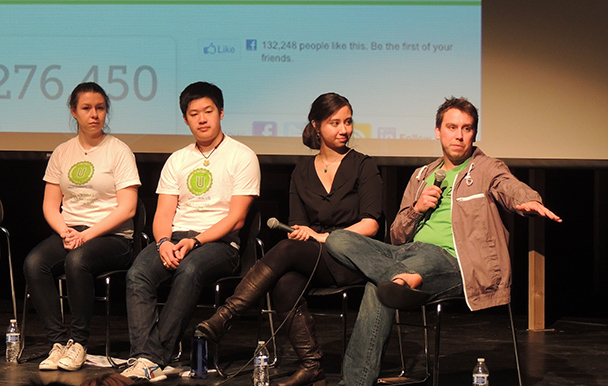 Kiva staff members field questions from the crowd.