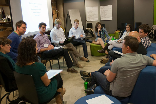 Fellows break into regional groups to learn more about their upcoming assignments.