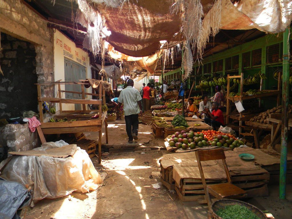 A slice of life is captured in a market in Mombasa, Kenya by David Picciao.