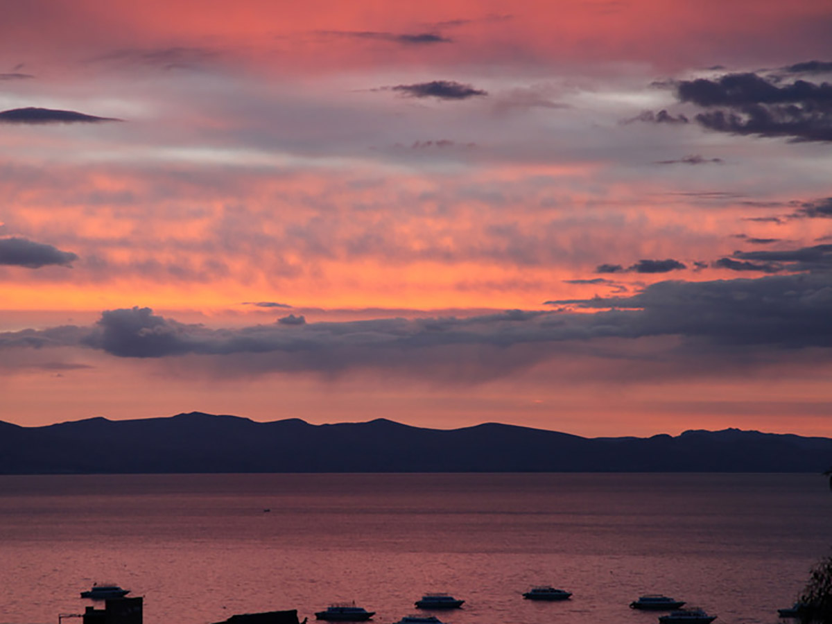 A magnificent sunset over Lake Titicaca rounds out Zach Land-Miller work in Bolivia.