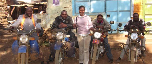 Kiva borrowers, their bikes, and their loan officer, Carol, are ready to roll in Kenya.