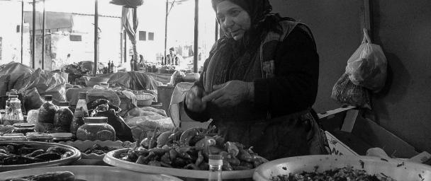 Almas has been running this produce stand since 1982. Her husband used to work as a repair man, but due to an injury had to stop. They opened the stand together and after one year Almas ran it on her own. He now manages the loan and she runs the store. During the winter, she makes pickled produce. In the Spring, she sells fresh vegetables as they grow abundantly in Azerbaijan.