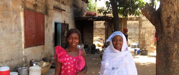 Mother and daughter CAURIE borrowers, Fautou and Sylla in Senegal. Fatou took her last loan to help her son open a small shop.