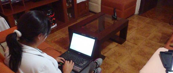 Ivonne prepping reports from home.