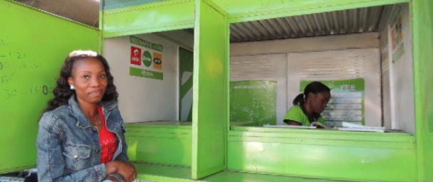 Sandra in front of one of her four (!) mobile transactions booths