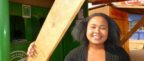 Angela outside her Zoona kiosk